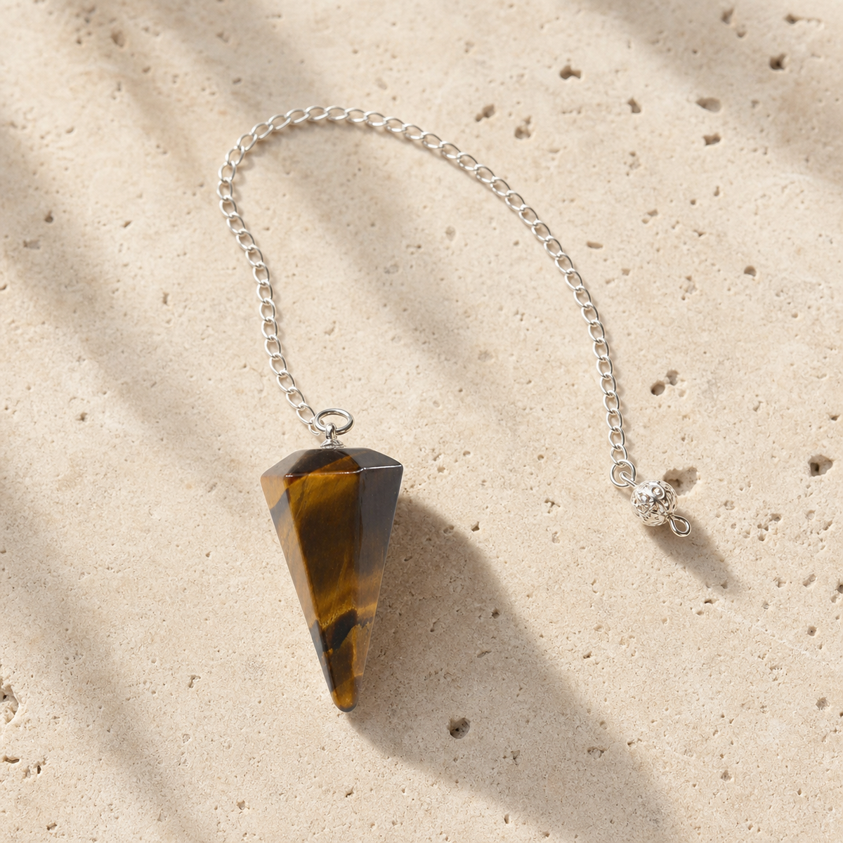 Pendule Radiesthesie - Oeil de Tigre — photographie produit premium