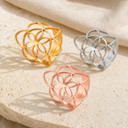 Bague Graine de Vie ajourée en acier inoxydable réglable — photographie produit premium