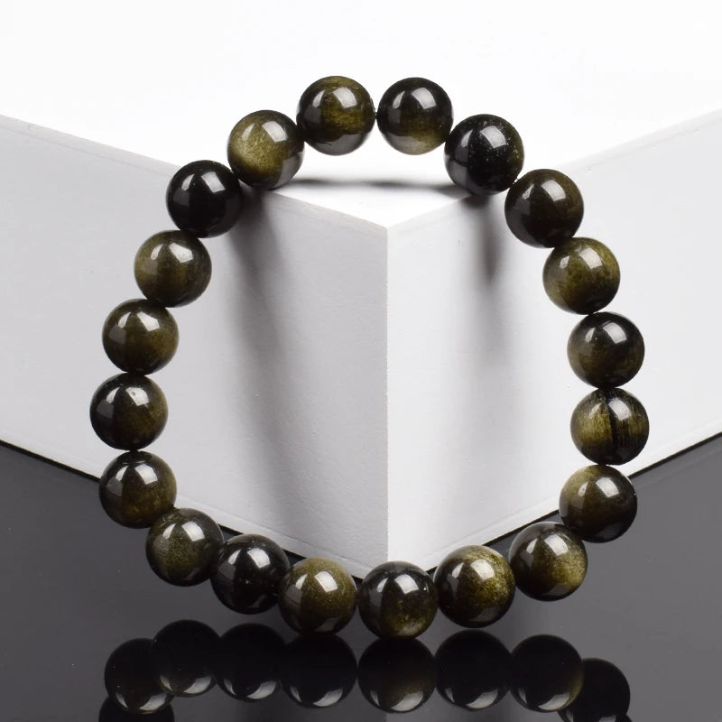Bracelet obsidienne dorée 8 mm vu de face, reflets dorés des perles